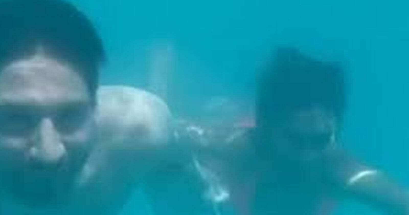 ميسي و زوجته تحت الماء