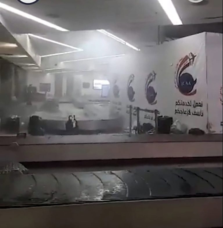 قاعة الحقائب في مطار بغداد الدولي watanserb.com