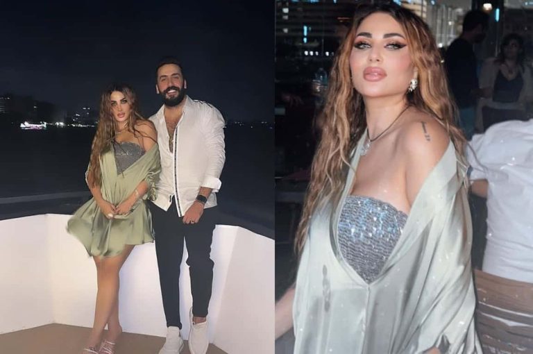 صورة زوج ندى الكامل يقبلها على رقبتها تثير الجدل